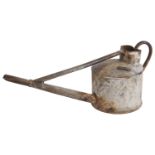 A vintage galvanised watering can