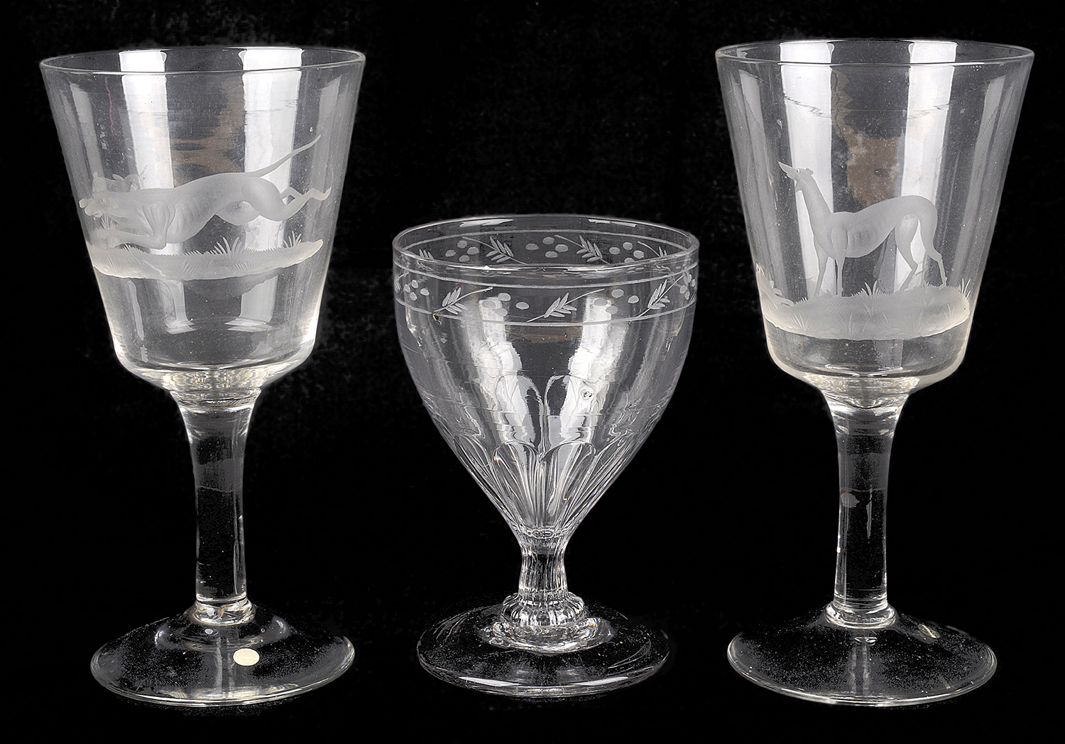 A pair of engraved hunting interest oversize wine glasses, early 19th century