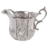 A Victorian silver cream jug, hallmarked Birmingham 1893