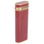 Must de Cartier red lacquered and gilt metal lighter (3)