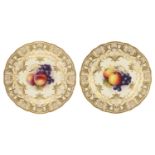 A pair of Royal Worcester porcelain cabinet plates, circa 1926