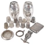 A collection of Victorian and later silver thimbles and other silver trinkets