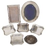 A set of four Art Deco silver trays, hallmarked London 1928 & 1930