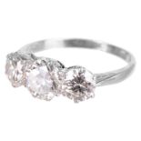 An attractive three stone diamond set ring