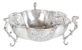 An Edwardian three handled lobed silver bowl, hallmarked Chester 1905