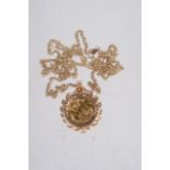An Elizabeth II, 1966 fine gold sovereign in foliate pendant mount