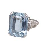 A large Continental rectangular cut aquamarine and diamond cocktail ring