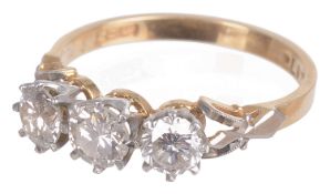 A three stone diamond set ring