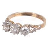 A three stone diamond set ring