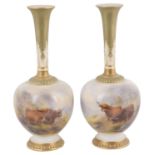 A pair of Royal Worcester porcelain bottle vases, circa 1912