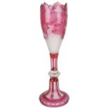 A Bohemian cranberry flashed and engraved glass vase, late 19th century