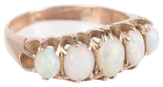 A Victorian five stone opal set half hoop ring