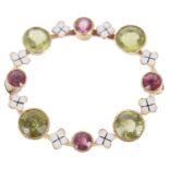 A delicate Edwardian peridot and pink gem circle posy brooch