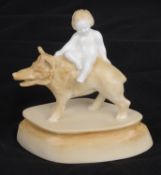 A Royal Worcester porcelain model "Boy on Boar", circa 1931