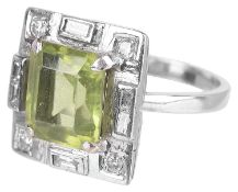 An Art Deco style perridot and diamond set ring