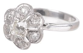 A Continental old cut diamond set cluster ring