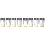 Stuart Leslie Devlin set of eight parcel-gilt silver beakers, hallmarked London 1972