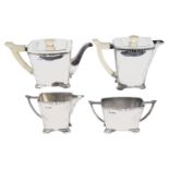 A George VI Art Deco four piece silver and ivory tea service, hallmarked Sheffield 1939