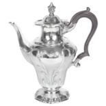 An Edwardian silver water jug, hallmarked London 1906