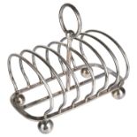 A Victorian silver six section toast rack, hallmarked Sheffield 1880