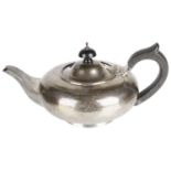 A George V silver bachelor's teapot, hallmarked London 1928