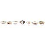 A collection of gold mounted, diamond and gem set rings