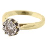 A gold mounted single stone diamond set ring