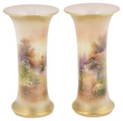 A pair of Royal Worcester porcelain beaker vases, circa 1923