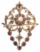 An Edwardian style Continental garnet set pendant brooch