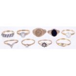 A sapphire set half eternity ring; various other gold rings