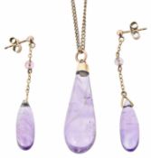 An Art Deco amethyst drop pendant and drop earrings