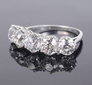 A large Continental five stone diamond set ring, c1940