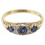 A three stone Victorian style sapphire and diamond point ring