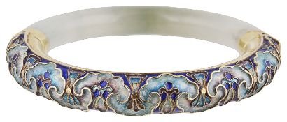 An Chinese jade and enamel, yellow metal mounted hinged bangle