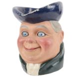 A ventriloquist/automaton papier mache Toby jug, mid 20th century