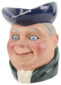 A ventriloquist/automaton papier mache Toby jug, mid 20th century