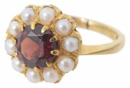 A garnet and cultured pearl cluster ring