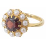 A garnet and cultured pearl cluster ring