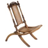 A Victorian mahogany caned folding chair