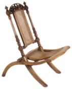 A Victorian mahogany caned folding chair