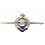 A diamond set rose gold Royal Engineers enamelled sweetheart pin