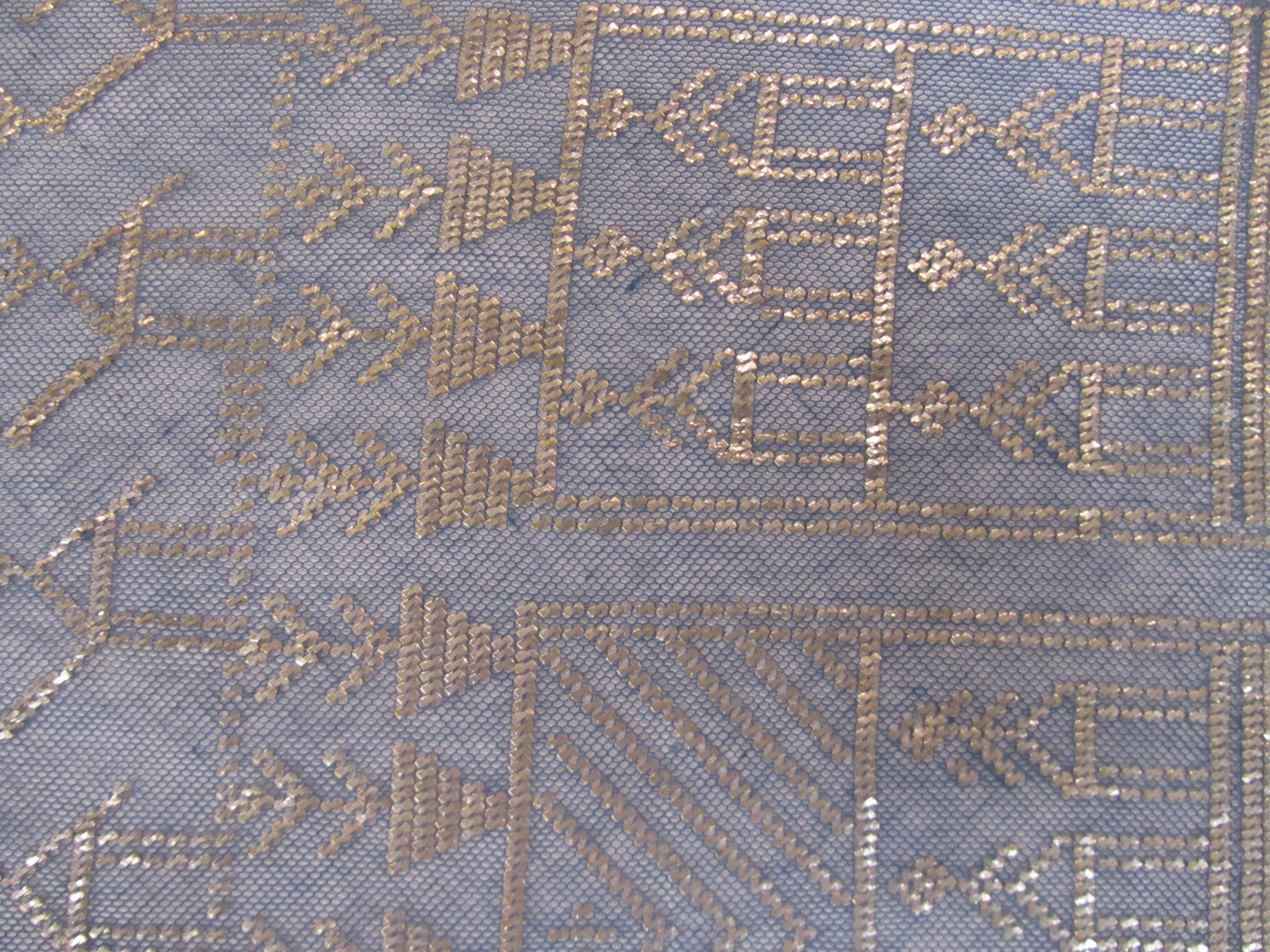 An early 20th century Assuit Egyptian worked silver metal shawl, c1920 - Image 18 of 19