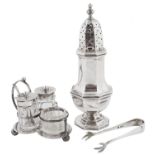 A silver sugar sifter, sugar nips and condiment trio