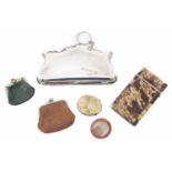 A small collection of purses and other items