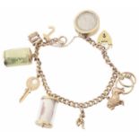 A 9ct rose gold curb link charm bracelet with heart padlock fastening