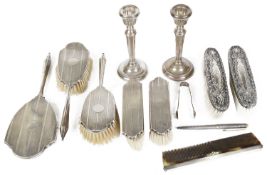 Selection of silver, dressing brushes, candlesticks, others