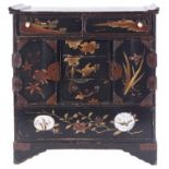 A Japanese lacquered table cabinet, 20th century