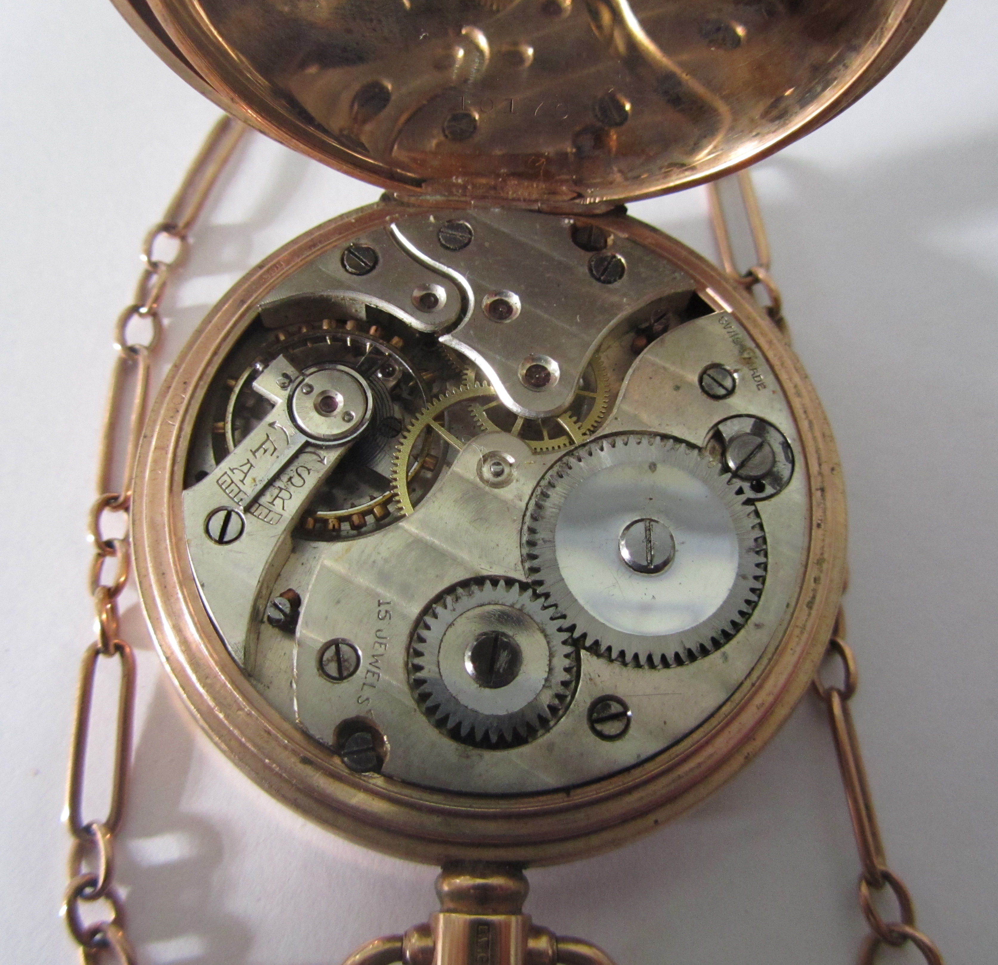 A 9ct rose gold open faced pocket watch; Albert watch chain - Image 6 of 7