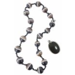 A Victorian banded agate bead necklace and oval pendant