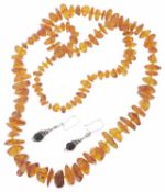 Baltic amber necklace together with a pair of amber earrings